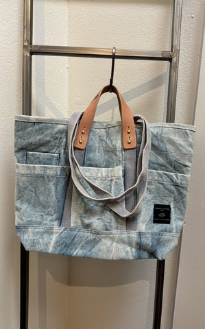 Immodest cotton construction tote in acid wash